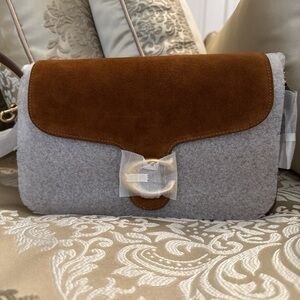 Elegant Brown Suede Coach Tabby